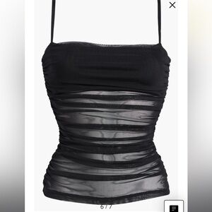 mesh see through top, chest is closed. never worn.